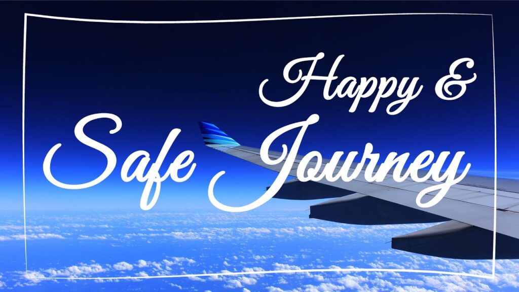 A scenic airplane wing view over the clouds with the text "Happy & Safe Journey A scenic airplane wing view over the clouds with the text "Happy & Safe Journey