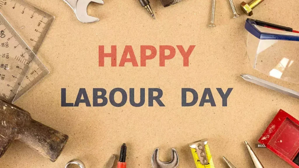 A Labour Day greeting with 'Happy Labour Day' written on a brown textured background, surrounded by various tools such as a hammer, ruler, wrench, and screws. A Labour Day greeting with 'Happy Labour Day' written on a brown textured background, surrounded by various tools such as a hammer, ruler, wrench, and screws.